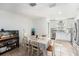 Dining area with seating for six, conveniently located next to the modern kitchen at 5632 62Nd N St, St Petersburg, FL 33709