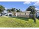 Inviting single-Gathering home with well-maintained lawn and neutral-toned exterior at 5632 62Nd N St, St Petersburg, FL 33709