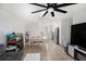 Bright, open living space with tile flooring, adjacent to a modern kitchen and dining area at 5632 62Nd N St, St Petersburg, FL 33709