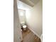 Cozy half bathroom featuring tile floor and toilet at 5644 Samter Ct, Tampa, FL 33611