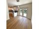 Eat-in-kitchen dining area with pendant lighting and sliding glass doors leading to the yard at 5644 Samter Ct, Tampa, FL 33611