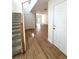 Welcoming foyer boasts hardwood floors, staircase, and plenty of natural light, creating an inviting entrance at 5644 Samter Ct, Tampa, FL 33611