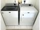 Modern laundry room showcasing a matching washer and dryer set for efficient laundry care at 5644 Samter Ct, Tampa, FL 33611