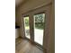 Double patio doors offering natural light and access to a well-maintained outdoor space at 5644 Samter Ct, Tampa, FL 33611