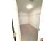 A carpeted walk-in closet has wire shelving units for optimal storage at 5644 Samter Ct, Tampa, FL 33611