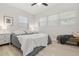 Well-lit bedroom featuring a cozy bed, fresh paint and plenty of natural light at 6334 22Nd N Ave, St Petersburg, FL 33710