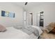 Clean bedroom with neutral décor, providing access to both a closet and an ensuite bathroom at 6334 22Nd N Ave, St Petersburg, FL 33710