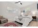 Cozy bedroom with natural light, stylish décor, and a comfortable rug that adds warmth to the space at 6334 22Nd N Ave, St Petersburg, FL 33710