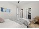 Bedroom featuring ceiling fan, ensuite bath, and an inviting atmosphere at 6334 22Nd N Ave, St Petersburg, FL 33710