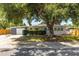 Well-maintained home exterior featuring mature trees, and inviting curb appeal at 6334 22Nd N Ave, St Petersburg, FL 33710