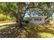Charming home with mature trees, lush landscaping, and inviting curb appeal at 6334 22Nd N Ave, St Petersburg, FL 33710