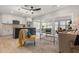 Bright, open-concept living area with modern finishes seamlessly integrated with the stylish kitchen at 6334 22Nd N Ave, St Petersburg, FL 33710