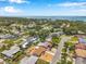 Breathtaking aerial view of a neighborhood near the water with a scenic bridge in the distance at 6352 Canton S St, St Petersburg, FL 33712
