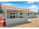 A large screened-in porch looks out to the gravel backyard at 6352 Canton S St, St Petersburg, FL 33712