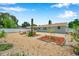 Spacious backyard with white fence, gravel, and low-maintenance landscaping for outdoor enjoyment at 6352 Canton S St, St Petersburg, FL 33712