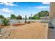 Spacious backyard featuring low-maintenance gravel, newly installed white fence, and potential for outdoor living at 6352 Canton S St, St Petersburg, FL 33712