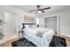 This cozy bedroom features neutral decor, wood floors, and ample closet space at 6352 Canton S St, St Petersburg, FL 33712