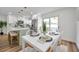 Dining area next to open kitchen has great lighting and updated finishes at 6352 Canton S St, St Petersburg, FL 33712