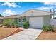 Charming single-story home with attached one-car garage and fresh landscaping at 6352 Canton S St, St Petersburg, FL 33712