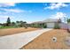 Well-maintained home with a long driveway and manicured landscaping at 6352 Canton S St, St Petersburg, FL 33712