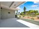 Covered front porch with painted brick wall and quaint landscaping in a desirable community at 6352 Canton S St, St Petersburg, FL 33712
