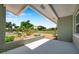 Inviting front porch with painted brick and charming landscaping offers a relaxing view at 6352 Canton S St, St Petersburg, FL 33712