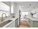Bright open kitchen and eating area with marble countertops and stainless steel appliances at 6352 Canton S St, St Petersburg, FL 33712