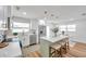 Modern, remodeled kitchen with stainless appliances, breakfast bar, and pendant lighting at 6352 Canton S St, St Petersburg, FL 33712