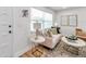 Cozy living room with neutral walls, recessed lighting, and wood-look flooring at 6352 Canton S St, St Petersburg, FL 33712