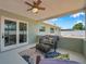 Inviting covered patio with wicker furniture that overlooks a large fenced-in backyard at 6352 Canton S St, St Petersburg, FL 33712