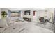 Open-concept living room with modern gray finishes, a fireplace, and ample space for dining at 6715 Ranchwood Loop, New Port Richey, FL 34653