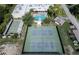 Aerial view of the community pool and tennis courts at 7941 58Th N Ave # 301, St Petersburg, FL 33709