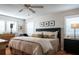Inviting bedroom with a large bed, stylish decor, ample natural light, and comfortable furnishings at 7941 58Th N Ave # 301, St Petersburg, FL 33709