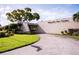 Exterior shot of Magnolia Sun Center entrance with paved driveway and manicured lawn at 7941 58Th N Ave # 301, St Petersburg, FL 33709