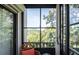 Relaxing sunroom/lanai offering lots of natural light with a charming seating area at 7941 58Th N Ave # 301, St Petersburg, FL 33709