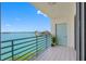 Condo balcony with railing and water view of the bay at 7979 Sailboat Key S Blvd # 505, South Pasadena, FL 33707