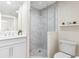 Modern bathroom features a glass-enclosed shower, sleek vanity, and contemporary fixtures at 7979 Sailboat Key S Blvd # 505, South Pasadena, FL 33707
