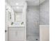 Contemporary bathroom with glass enclosed shower, modern vanity and sleek fixtures at 7979 Sailboat Key S Blvd # 505, South Pasadena, FL 33707