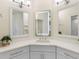 Bathroom with updated lighting, double mirrors and vanity at 7979 Sailboat Key S Blvd # 505, South Pasadena, FL 33707