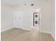 Bedroom with access to in-unit washer/dryer and double-door closet at 7979 Sailboat Key S Blvd # 505, South Pasadena, FL 33707