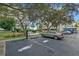 Electric vehicle charging station available for residents, set near a peaceful pond with a fountain at 7979 Sailboat Key S Blvd # 505, South Pasadena, FL 33707