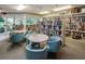 Community library with comfortable seating and extensive bookshelves at 7979 Sailboat Key S Blvd # 505, South Pasadena, FL 33707