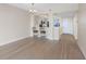 Open floor plan living area with bright kitchen and barstool seating, great natural light and views at 7979 Sailboat Key S Blvd # 505, South Pasadena, FL 33707