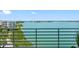 Scenic water view from a balcony, showcasing the tranquil bay and lush shoreline at 7979 Sailboat Key S Blvd # 505, South Pasadena, FL 33707