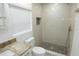 Bathroom with shower, tiled floors, vanity, and natural light at 814 W 131St Ave, Tampa, FL 33612