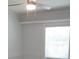Bedroom with vinyl floors, neutral paint, window, and ceiling fan at 814 W 131St Ave, Tampa, FL 33612