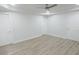 Spacious bedroom with neutral walls, wood flooring and a ceiling fan at 814 W 131St Ave, Tampa, FL 33612