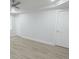 Large bedroom with light wood floors, crown molding and two closets at 814 W 131St Ave, Tampa, FL 33612