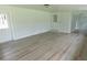 Bonus room features wood-look floors, fresh paint, and two entrances at 814 W 131St Ave, Tampa, FL 33612