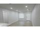Bright, airy living room with recessed lighting and light-colored wood floors at 814 W 131St Ave, Tampa, FL 33612